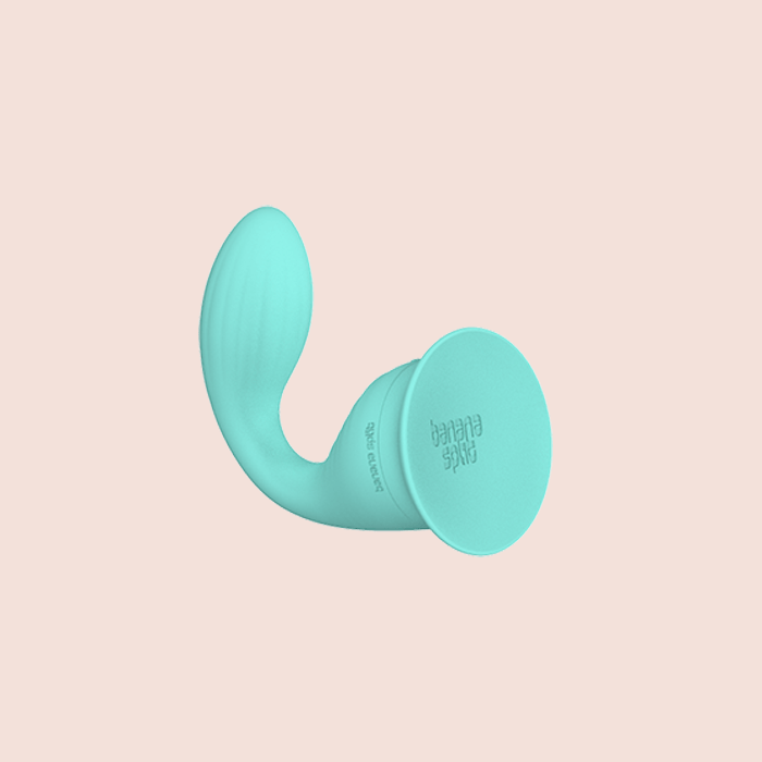 The Dollop — dual-motor vibrator with suction-cup base, mint